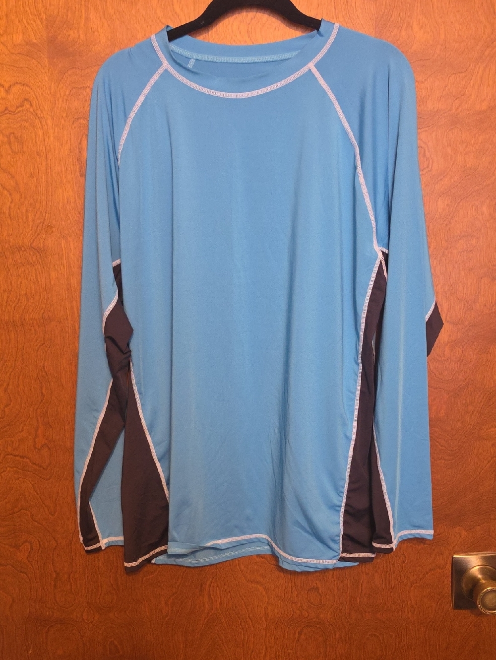 Light Blue Long Sleeve Athletic Top with Dark Gray Panels